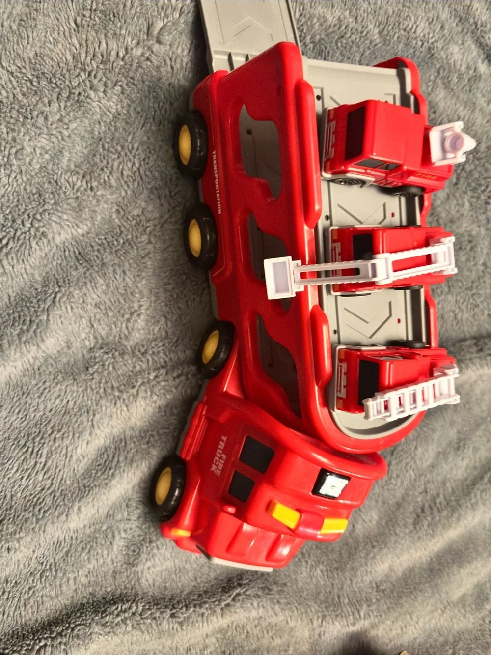 Red Fire Truck Carrier Playset with Yellow Wheels